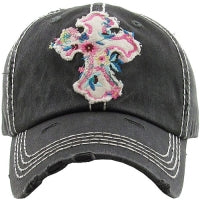 White cross on black hat